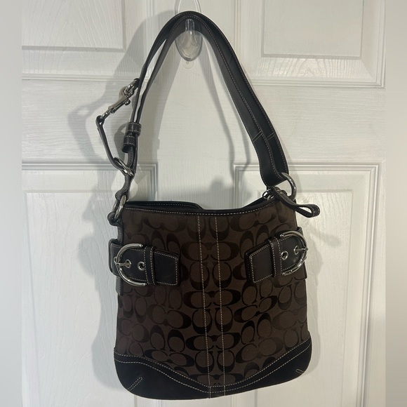 Coach Handbags - Vintage Coach Soho Signature Duffel bag brown canvas Logo leather trim